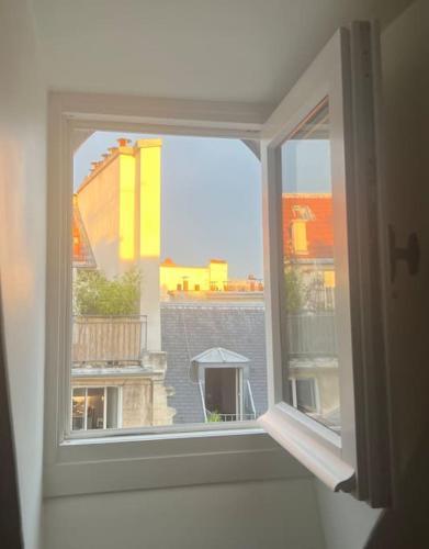Marais - Appartement sur les toits - Tap to explore photos