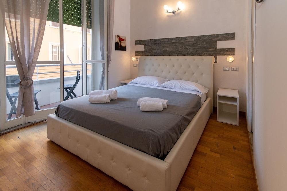 Exa Rooms - Prati - Tap to explore photos