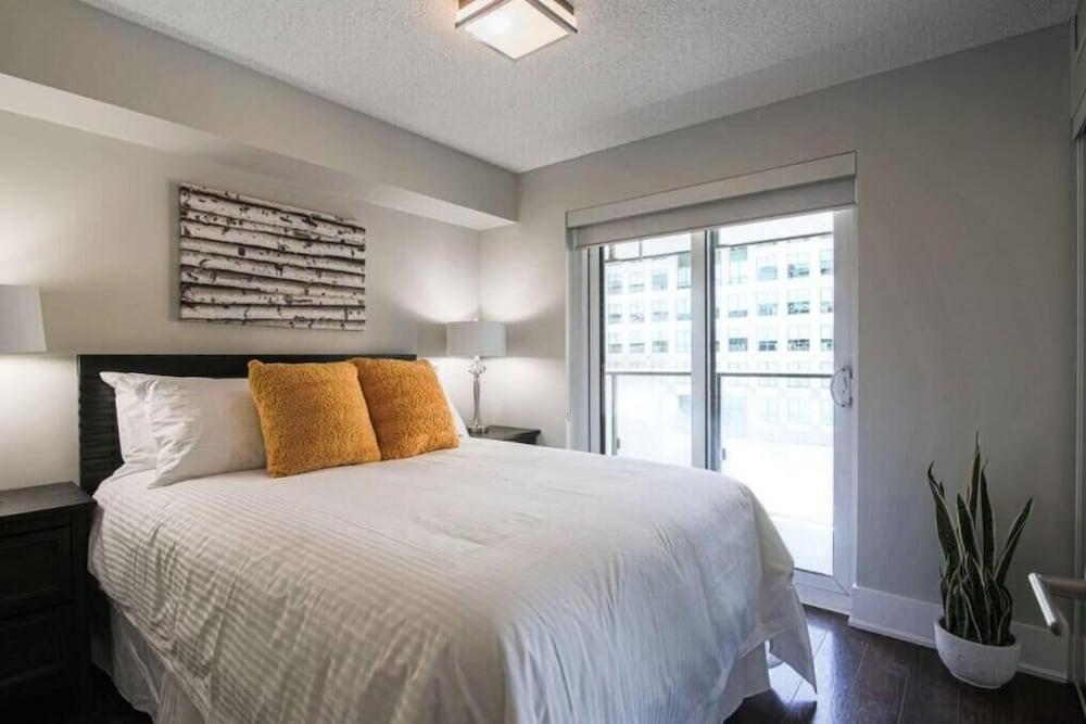 Skyline Suites - Next to MTCC, ACC & CN Tower Room Type - Family Apartment Skyline Suites - Next to MTCC, ACC & CN Tower Room Type - Family Apartment