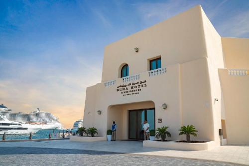 Mina Hotel and Residences By the Torch - Tap to explore photos