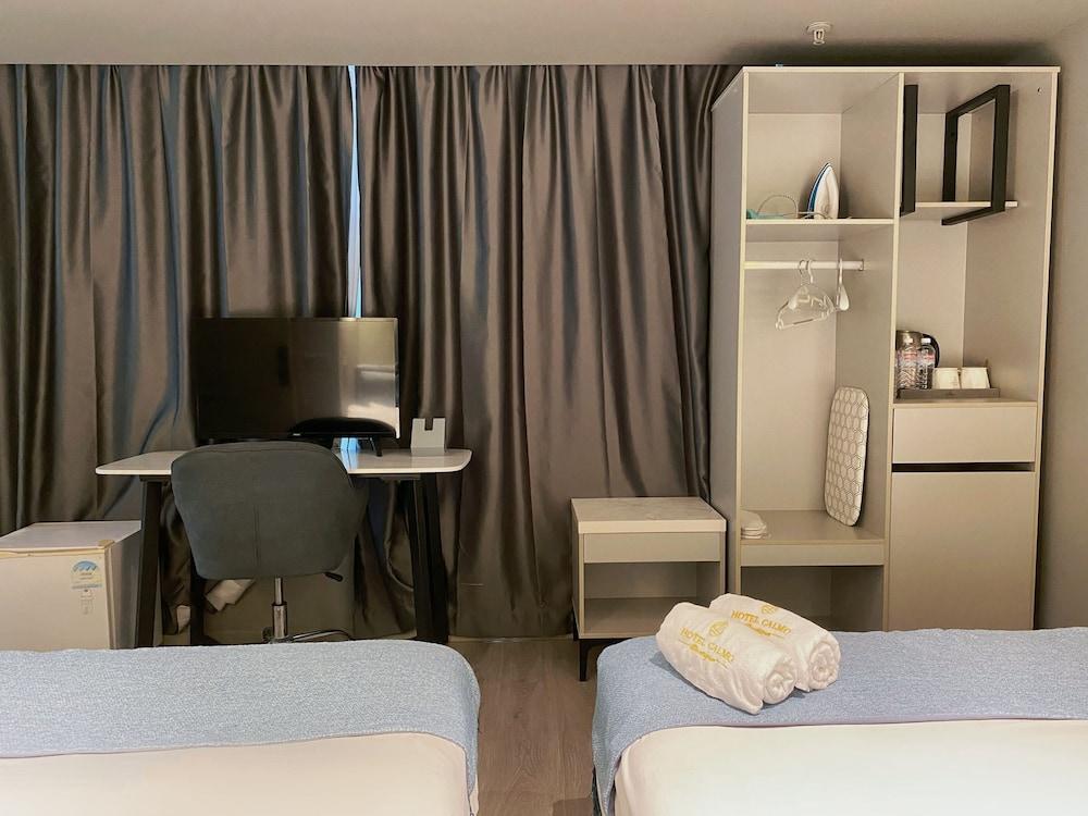 Hotel Calmo Bugis - Tap to explore photos