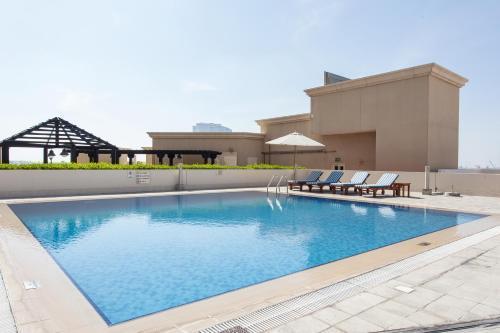 Staycae Holiday Homes - Suburbia, Jebel Ali - Tap to explore photos
