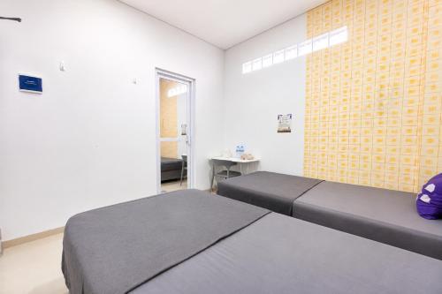 Monggo Mampir Tanjung Duren By Reccoma Room Type - Deluxe Twin Room