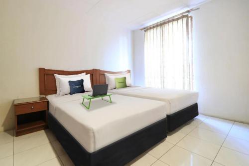 Urbanview Hotel Mroom PH Kemang