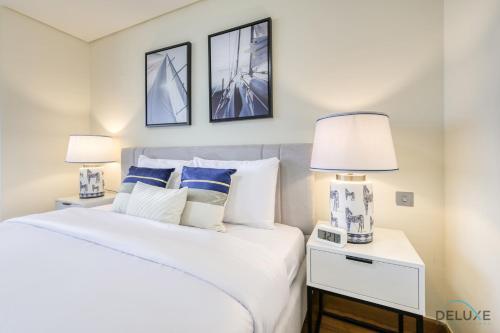 Best Value Modern 1BR with Pool & Stunning Views by Deluxe Holiday Homes - Tap to explore photos
