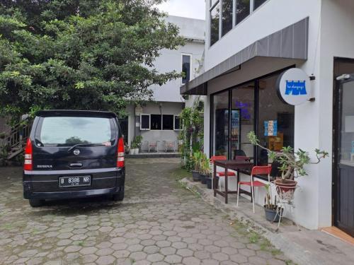 UNIK Guest House Syariah - Tap to explore photos
