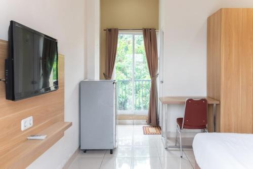 TwoSpaces Living at Kost 40, Kuningan - Tap to explore photos