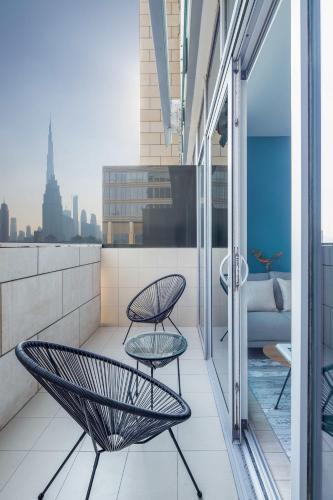 Silkhaus elegant studio with Burj Khalifa view and balcony - Tap to explore photos