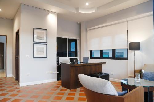 The Langstan Suites - Tap to explore photos