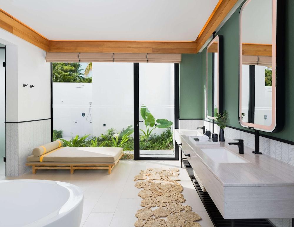 Hilton Maldives Amingiri Resort & Spa - Tap to explore photos