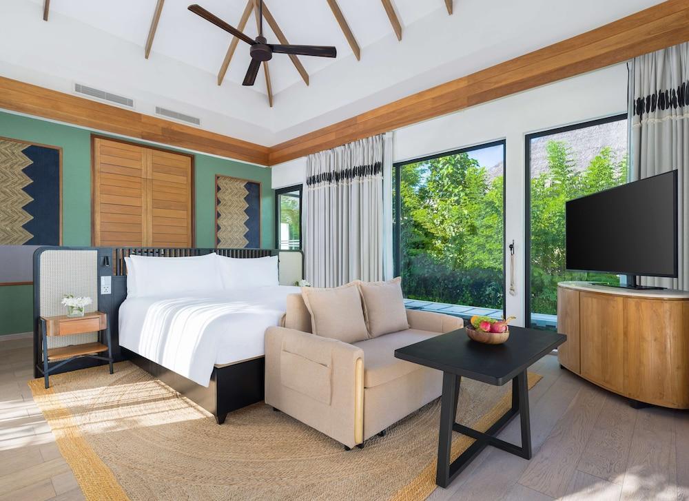 Hilton Maldives Amingiri Resort & Spa - Tap to explore photos