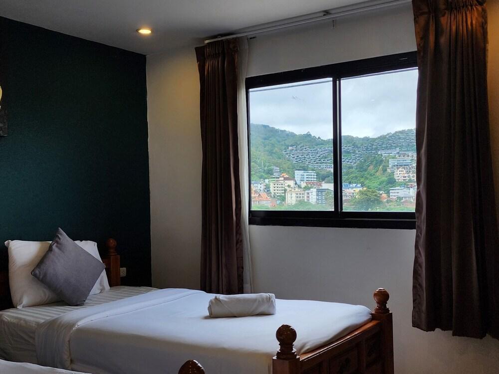 Patong Dynasty Royal Hotel - Tap to explore photos