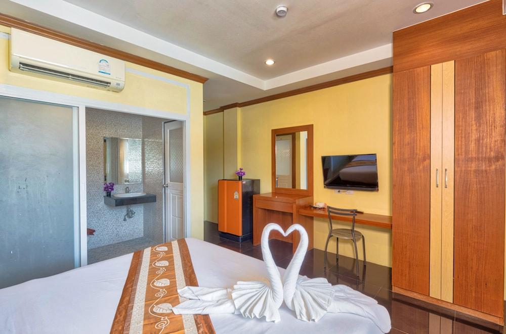 TJ Patong Hotel - - Tap to explore photos
