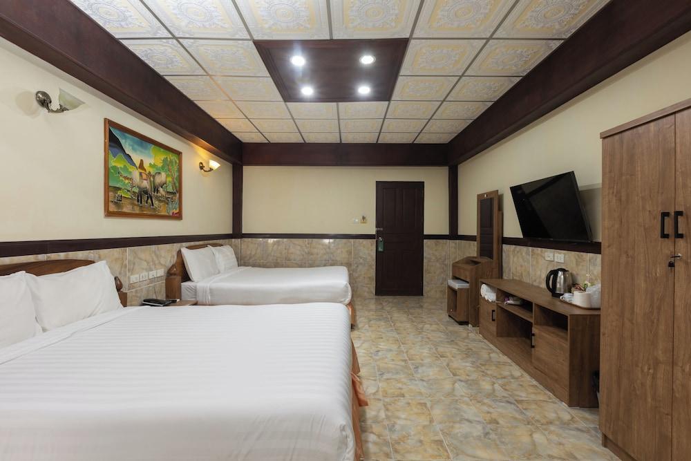 Kata Palace Phuket Hotel Room Type - Deluxe Quadruple Room, 2 Queen Beds, Balcony