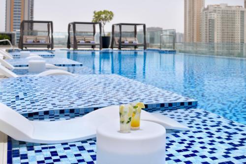 Movenpick Hotel Jumeirah Village Triangle - Tap to explore photos