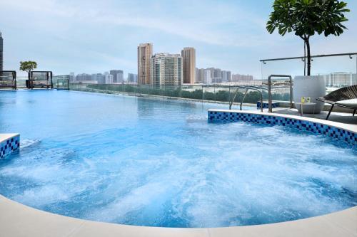 Movenpick Hotel Jumeirah Village Triangle - Tap to explore photos