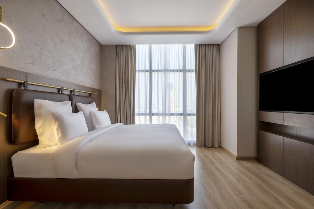 Movenpick Hotel Jumeirah Village Triangle Room Type - Deluxe Suite, 1 Double Bed, City View Movenpick Hotel Jumeirah Village Triangle Room Type - Deluxe Suite, 1 Double Bed, City View