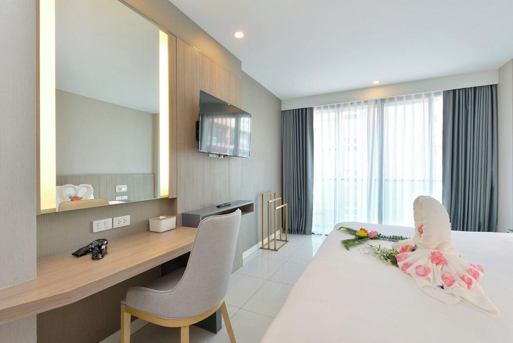 Grace Patong Hotel - Tap to explore photos