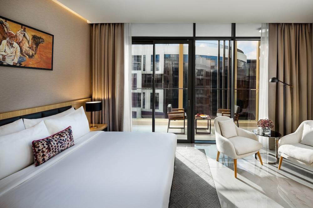 Millennium Place Mirdif Hotel Room Type - Premium Suite with One King Bed and Kitchen Millennium Place Mirdif Hotel Room Type - Premium Suite with One King Bed and Kitchen