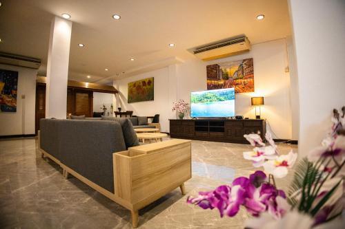 Rico's Patong Hotel - Tap to explore photos
