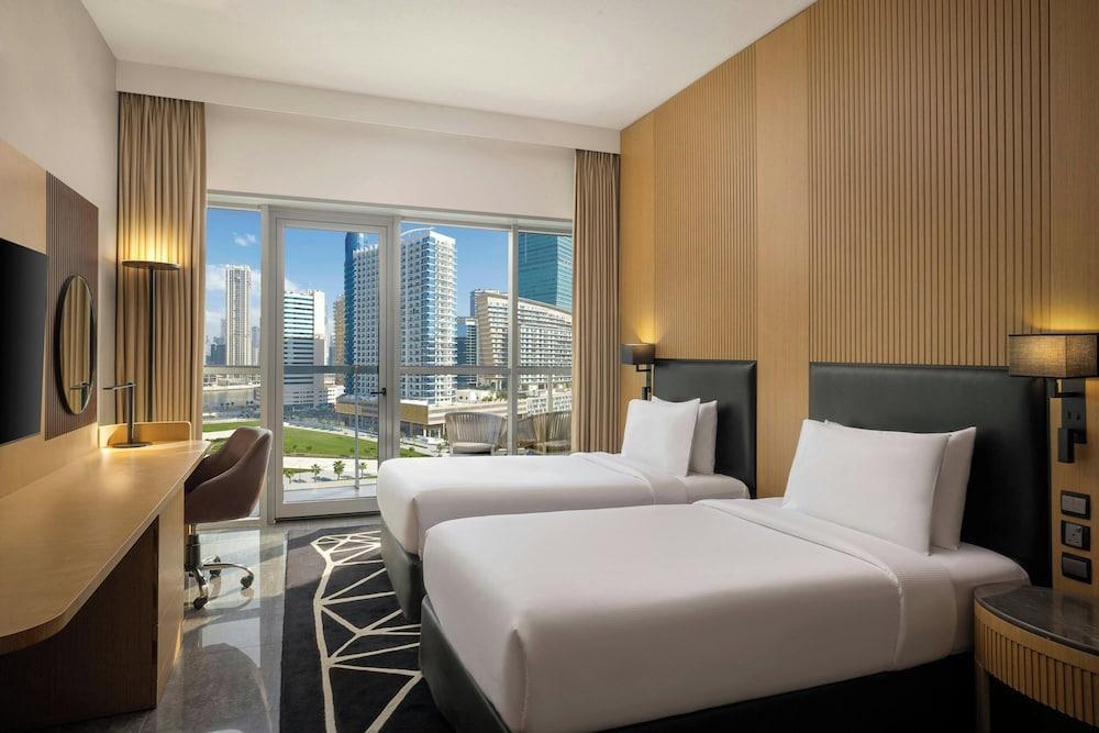 The First Collection Business Bay, Dubai, a Tribute Portfolio Hotel Room Type - Deluxe Twin Room with Balcony and City View