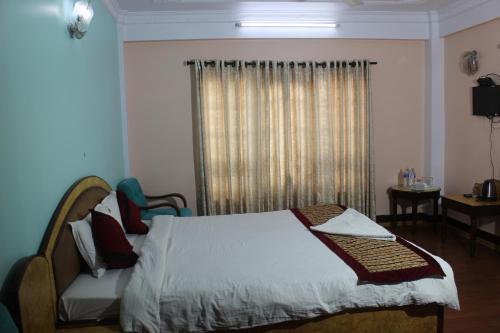 Hotel Happy Home or Mudkhu Durbar - Tap to explore photos