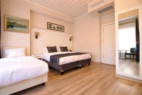 Olympos Garden Hotel Room Type - Deluxe Triple Room Olympos Garden Hotel Room Type - Deluxe Triple Room