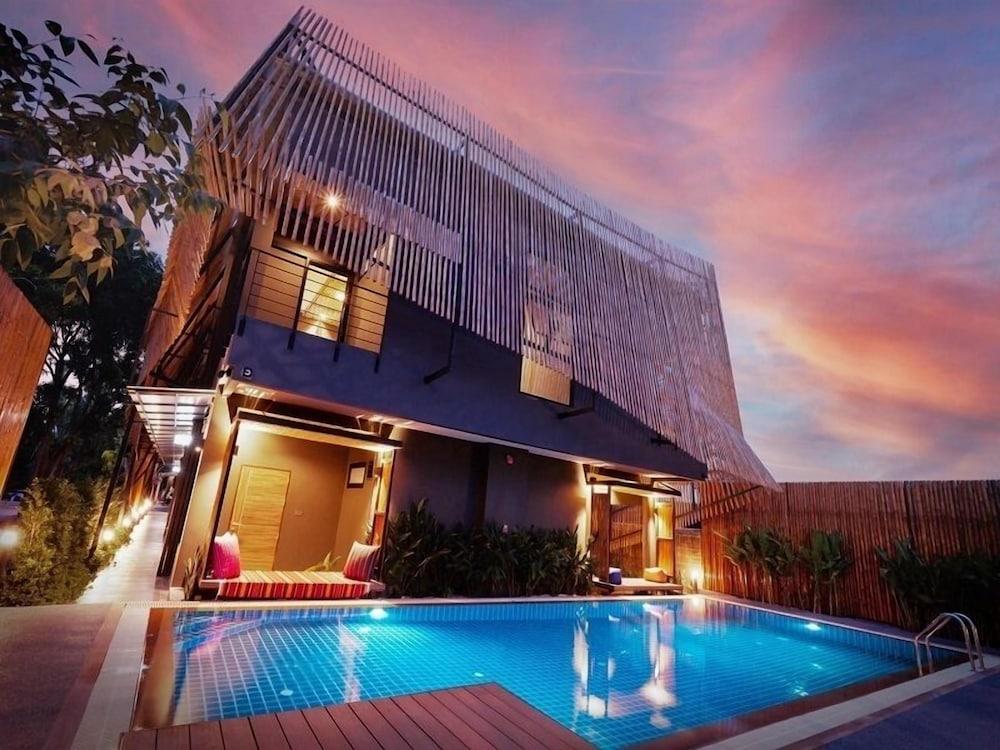 Sand Dollar Boutique Hotel - Tap to explore photos