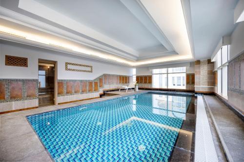 Dusit Hotel & Suites Doha - Tap to explore photos