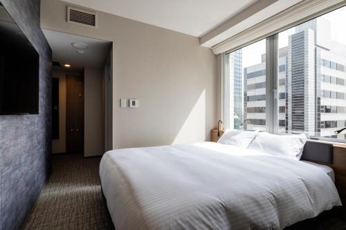 Hotel Rilassare Tokyo - Tap to explore photos