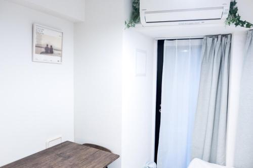NEST HATAGAYA Stylish Apt - Tap to explore photos