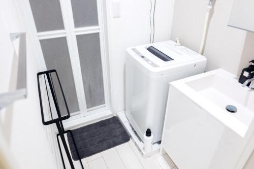 NEST HATAGAYA Stylish Apt - Tap to explore photos
