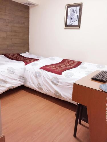 Hong Kong Tai San Guest House (Harilela Branch) - Tap to explore photos