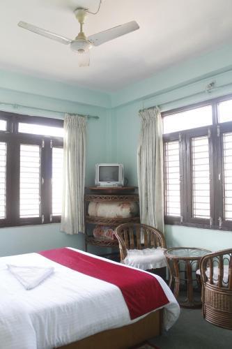 Pushpa Guest House - Tap to explore photos