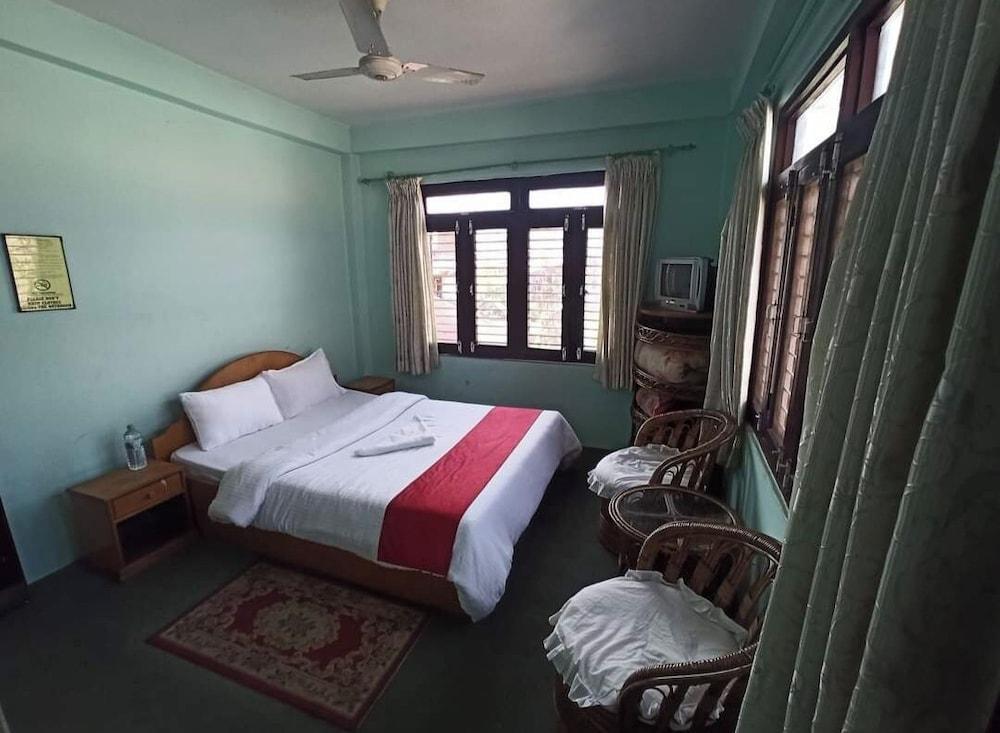 Pushpa Guest House - Tap to explore photos