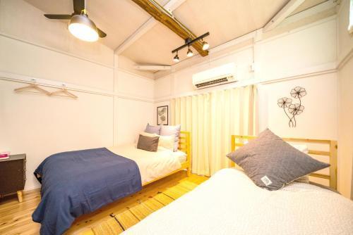 SMILE STAY Shinnakano - Tap to explore photos