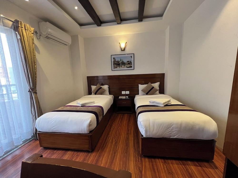 Hotel New Era Room Type - Deluxe Twin Room, City View