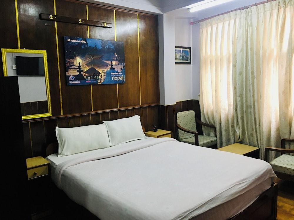 Hotel Plumeria Inn Room Type - Deluxe Double Room, 1 King Bed