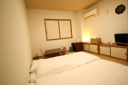 Okubo Hotel Hawaii - Tap to explore photos