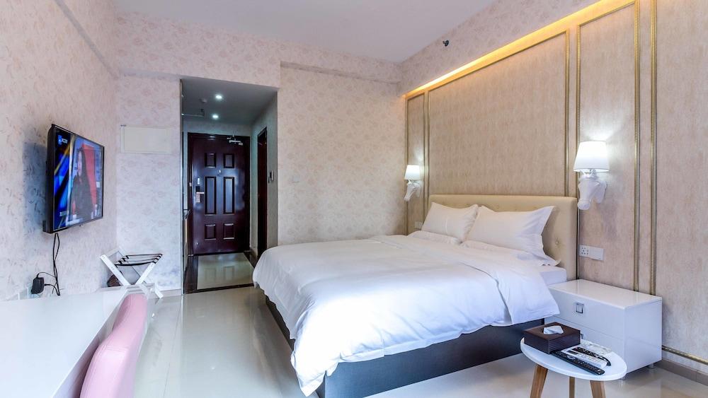 Guangzhou Yijia International Apartment - Tap to explore photos