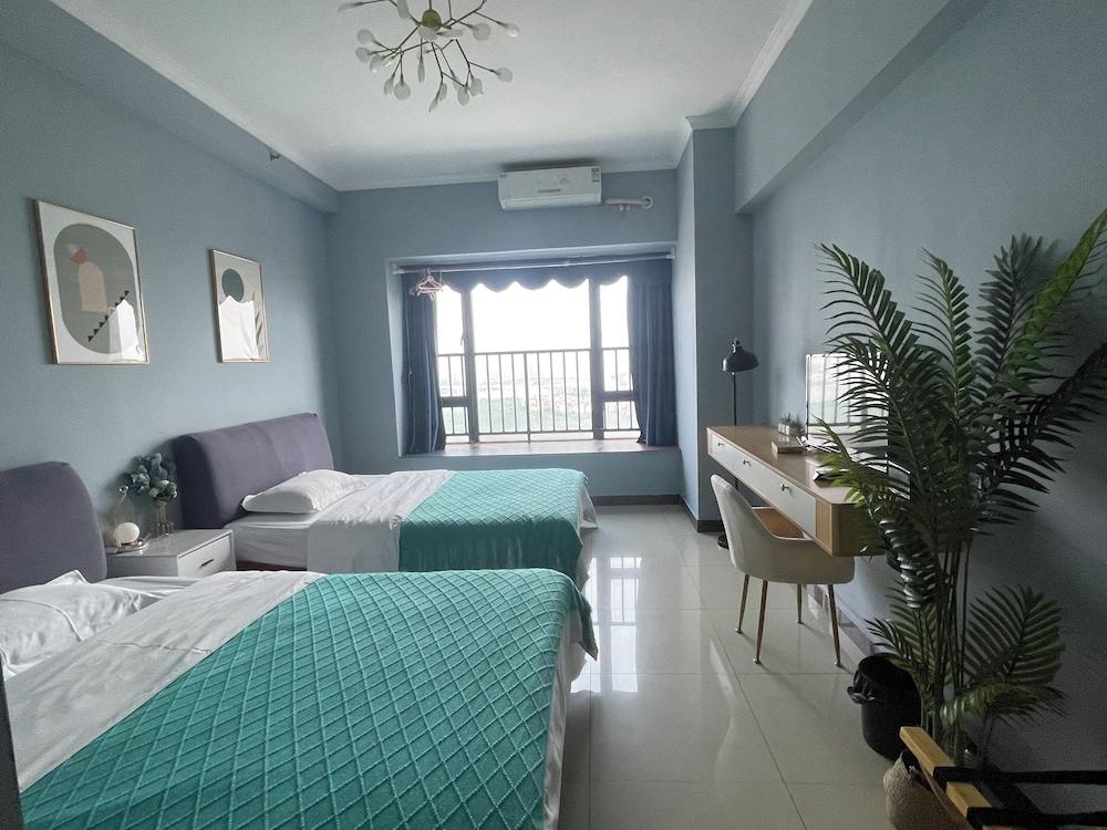 Yi Long International Apartment - Tap to explore photos