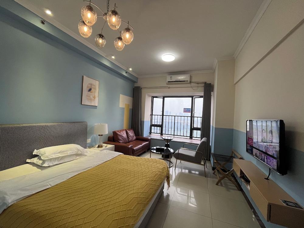 Yi Long International Apartment - Tap to explore photos