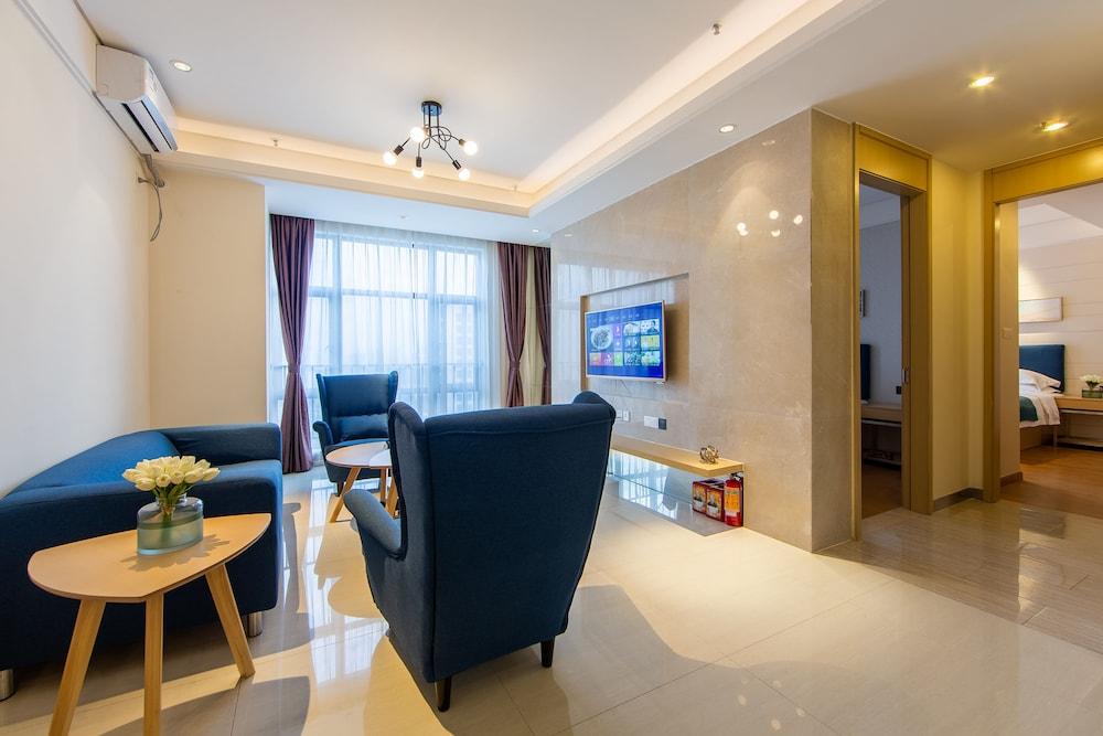 Poltton International Service Apartment Hesheng Palza Branch - Tap to explore photos