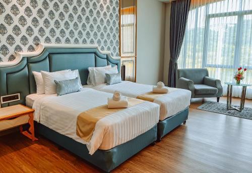 Grand Lord Hotel & Residence - Pattaya Room Type - Deluxe Double or Twin Room Grand Lord Hotel & Residence - Pattaya Room Type - Deluxe Double or Twin Room