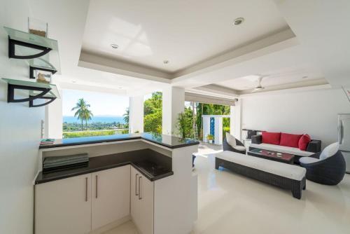 White Stone - Sunset View 4 Bed Pool Villa - Tap to explore photos