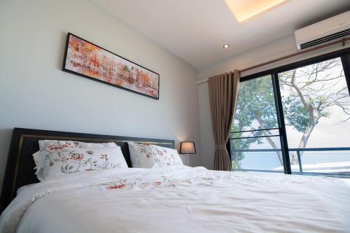 Koh Sirey Beachfront Pool Villa - 2 Bedrooms House - Tap to explore photos