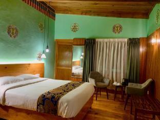 Hotel Dzi Pema - Tap to explore photos