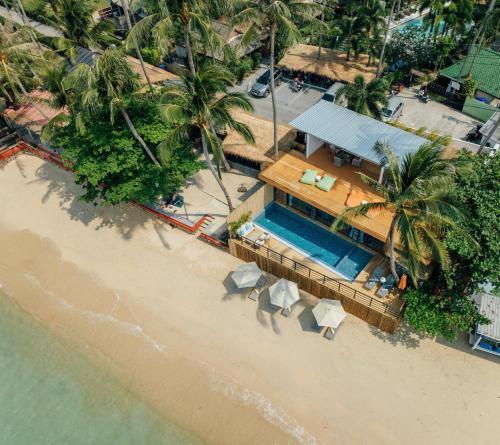 Absolute Beachfront Pool Villa with Rooftop Lounge & Sunset Views