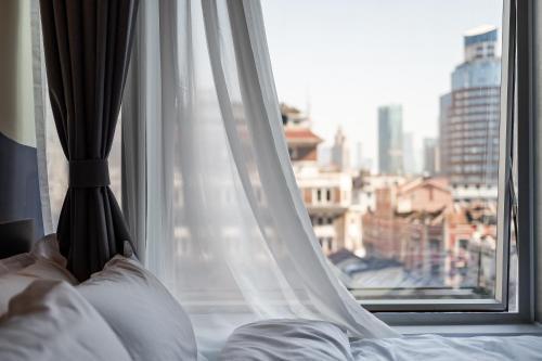 Dayin International Youth Hostel - East Nanjing Road & The Bund - Tap to explore photos