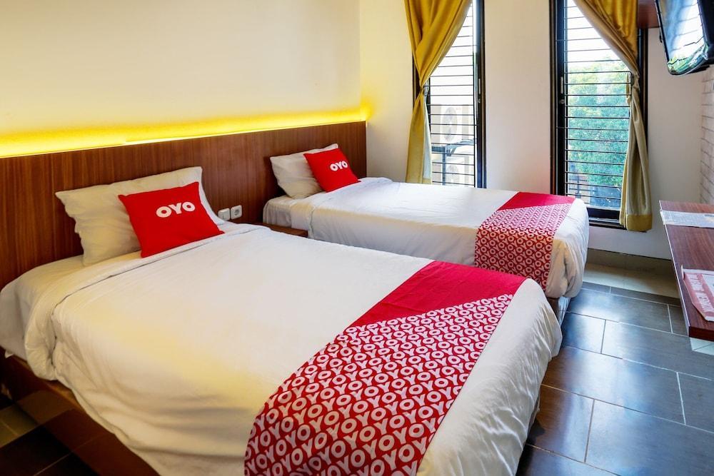 Hotel O Point Inn Room Type - Standard Twin Room
